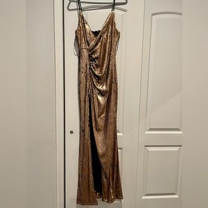 Gold sequin Dress, strapping with high slit.